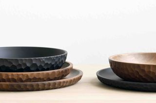 Series of dark coloured bowls