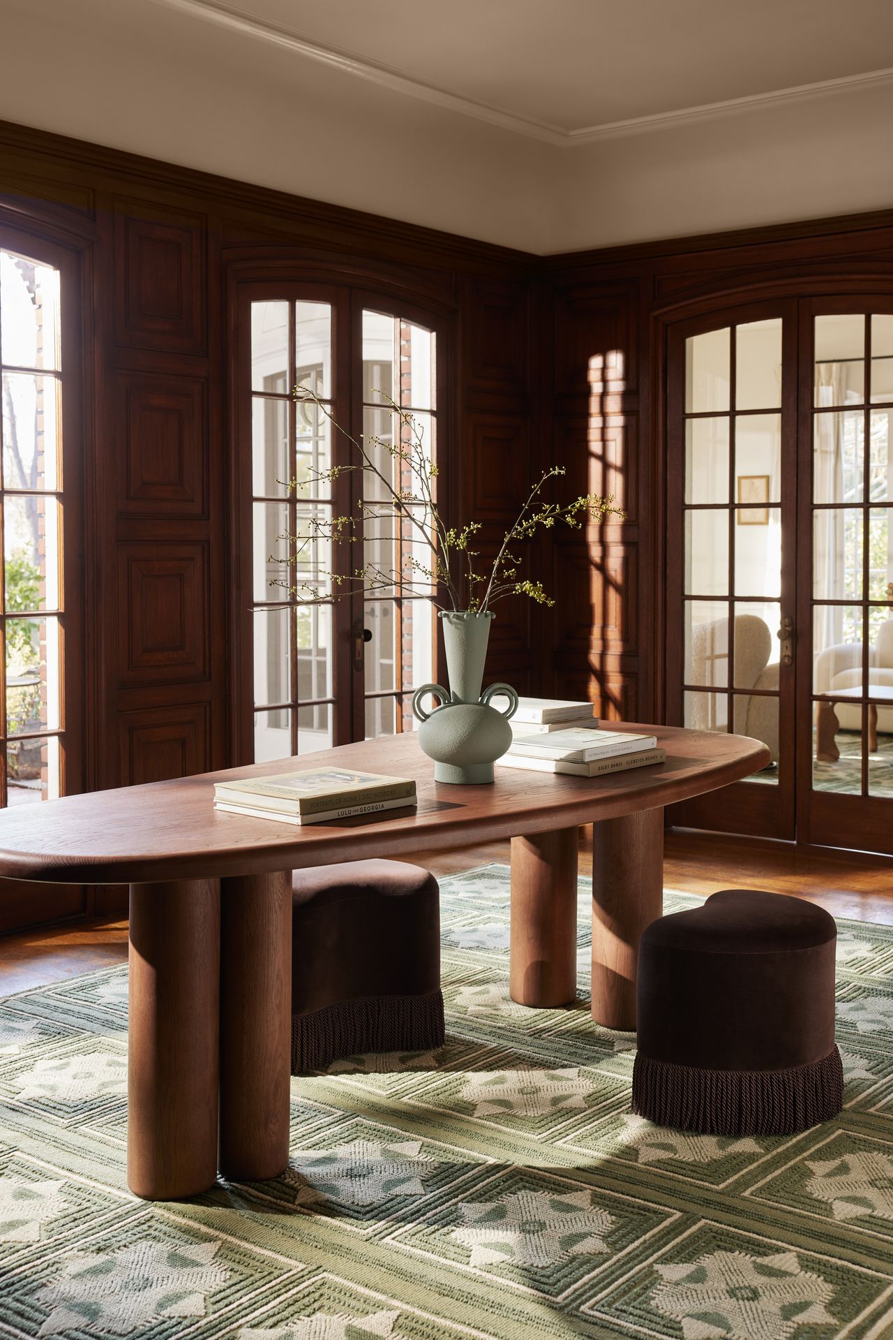 Ottomans, a green graphic rug, and sculptural desk from Aimee Song's new Lulu and Georgia collection
