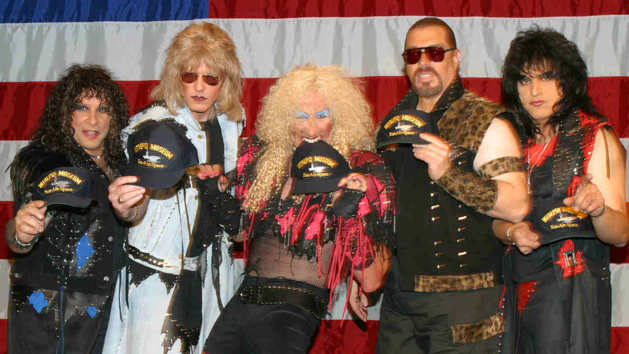 Twisted Sister posing for a photograph in 2003
