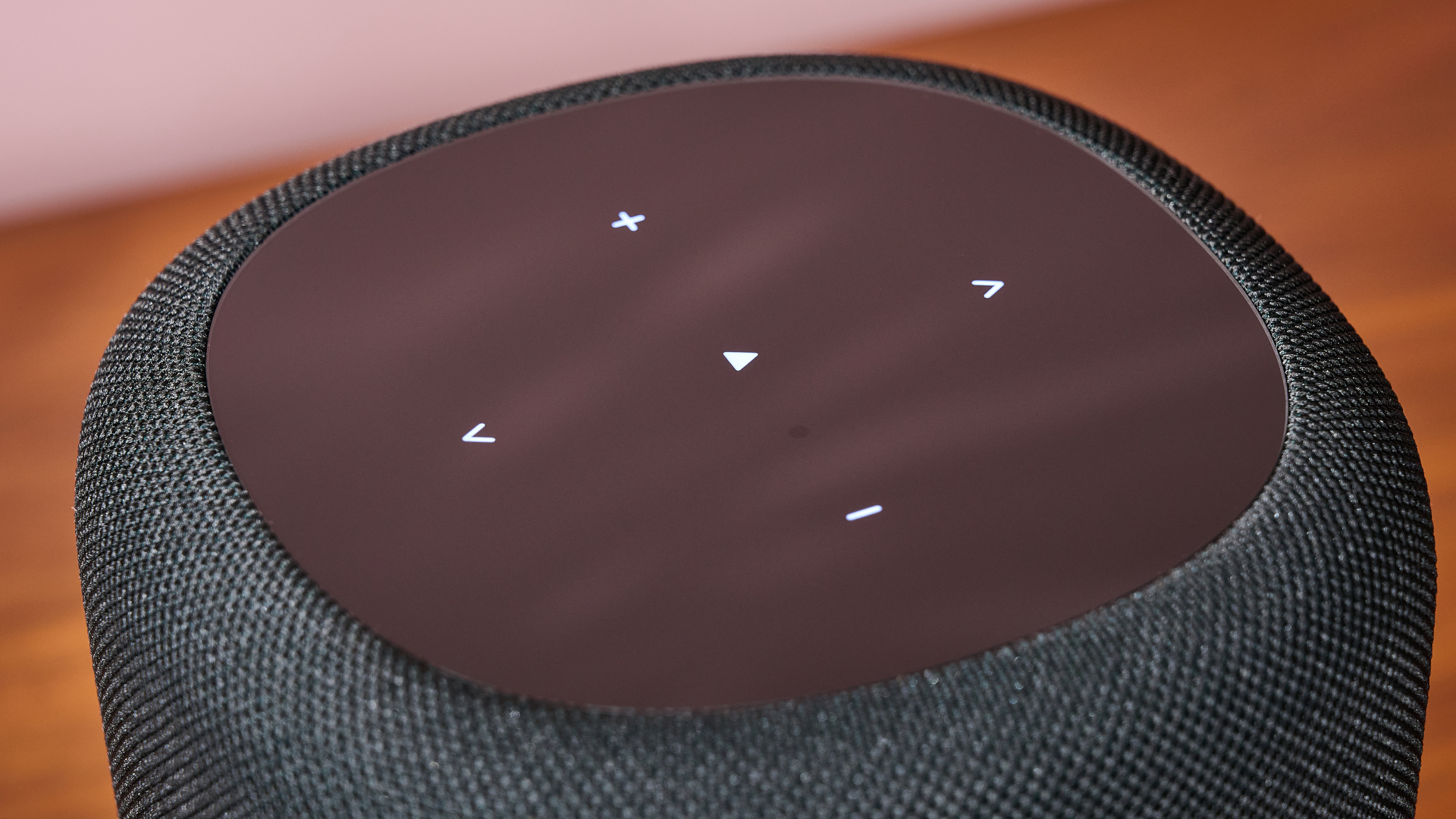 The top of the WiiM Sound, showing its light-up controls.