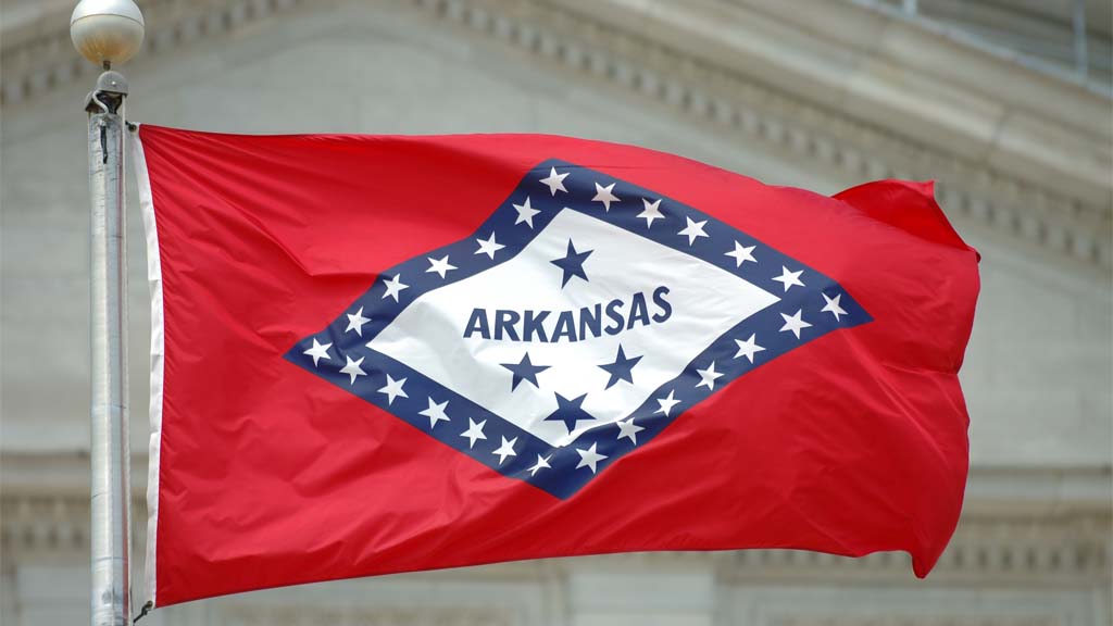 "Flying proudly in front of the state capitol building in Little Rock. Need photos representing the people, places and natural beauty of Arkansas"