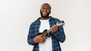 Man plays ukulele