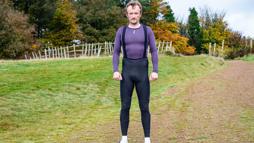 A man wearing a pair of Van Rysel RCR bib tights 