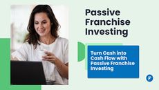 FranShares Passive Franchise Investing woman at laptop