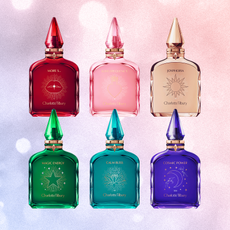 a collage of six charlotte tilbury fragrances that claim to change your mood in front of a colorful backdrop