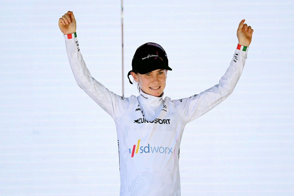 REGGIO EMILIA ITALY JULY 05 Niamh FisherBlack of New Zealand and Team SD Worx celebrates winning the white best young jersey on the podium ceremony after the 33rd Giro dItalia Donne 2022 Stage 5 a 1261km stage from Carpi to Reggio Emilia GiroDonne UCIWWT on July 05 2022 in Reggio Emilia Italy Photo by Dario BelingheriGetty Images