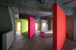 bright colours and brutalist concrete in artists studio in kanazawa by ab rogers