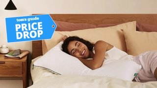 Woman lying on the Brooklinen Marlow Pillow