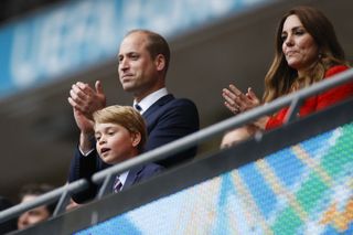Prince William, Duke of Cambridge, Prince George of Cambridge, and Catherine, Duchess of Cambridge, celebrate the win in the UEFA EURO 2020 round of 16 football match between England and Germany at Wembley Stadium