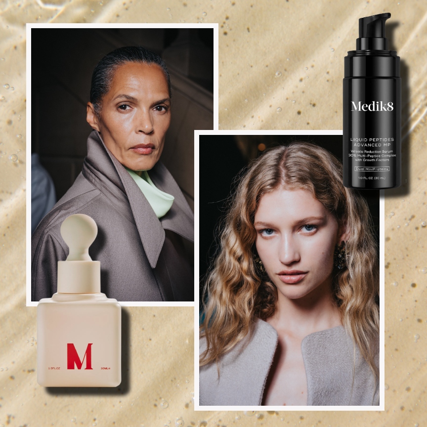 a tan watery background with an older black woman and a young white woman both in gray suits with a tan bottle with red writing and a black bottle with white writing