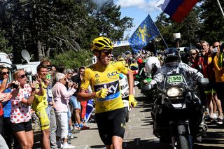 Chris Froome runs for the top of Mont Ventoux during stage 12 at the Tour de France