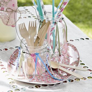 craft bottles with spoons and straw with plate