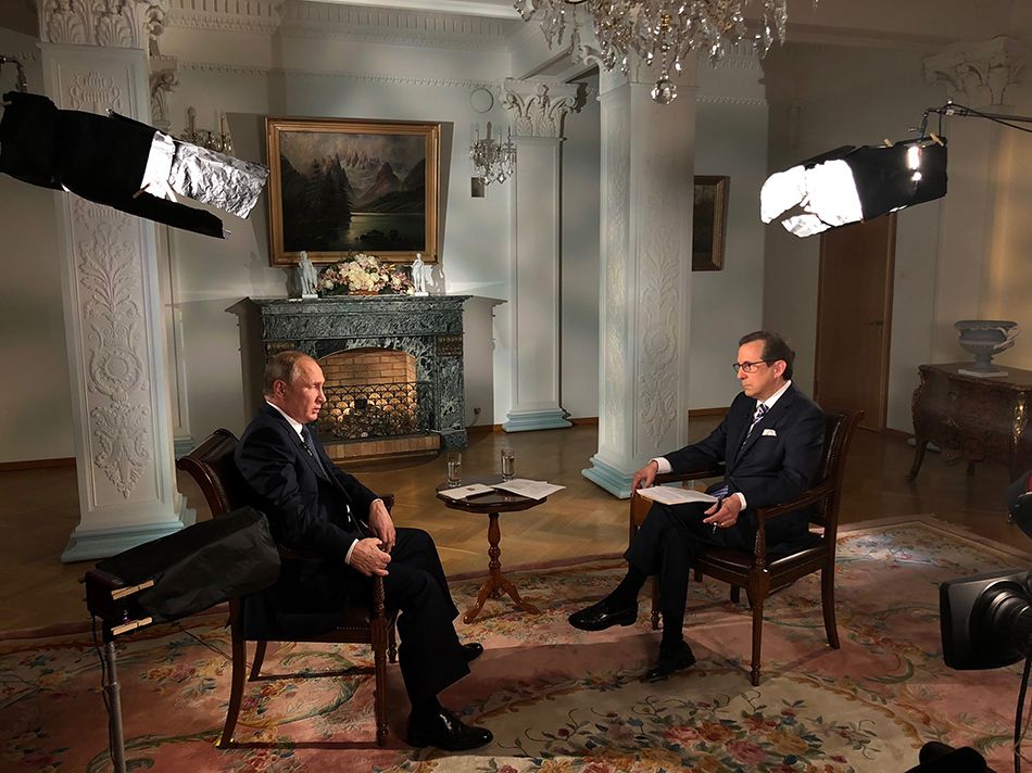 Chris Wallace and Vladimir Putin on Fox News Sunday