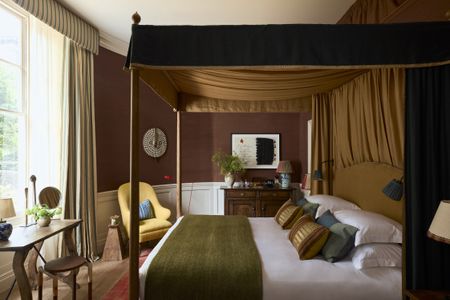 Hotel bedroom with four poster bed