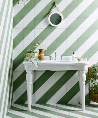 Bathroom with green and white tiles