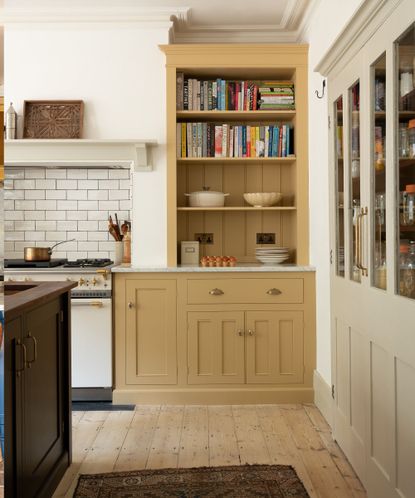 Devol Classic English kitchen with bespoke alcove shelving and pantry 