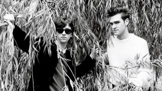 Johnny Marr (left) and Morrissey of the group The Smiths pose under the branches of a willow tree in London in 1983. 