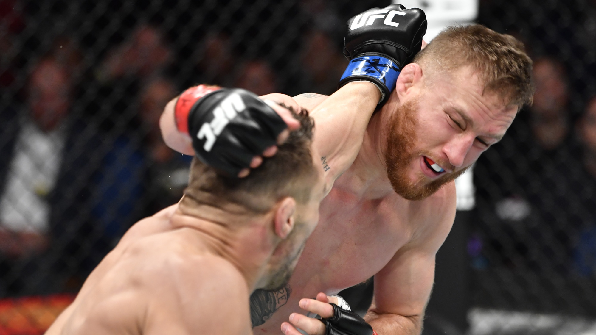 Justin Gaethje punching during a UFC bout