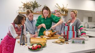 The 2024 woman&home festive food testing team deliberating over the turkey in this year's competition.