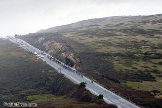 The peloton heads down Highway 1 on the way to Santa Cruz in the 2009 Amgen Tour of California