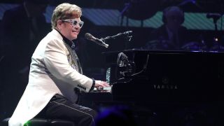 Elton John performs onstage during his "Farewell Yellow Brick Road" tour