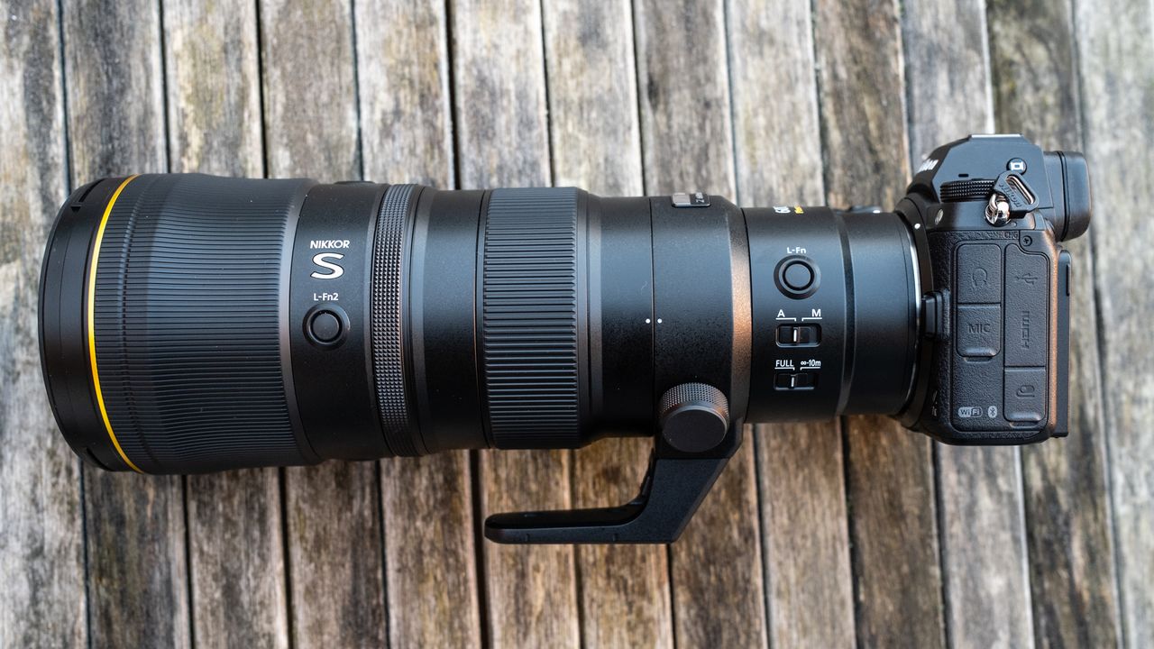 Nikkor Z 600mm f/6.3 VR S attached to a Nikon Z 7II on a frosty wooden table