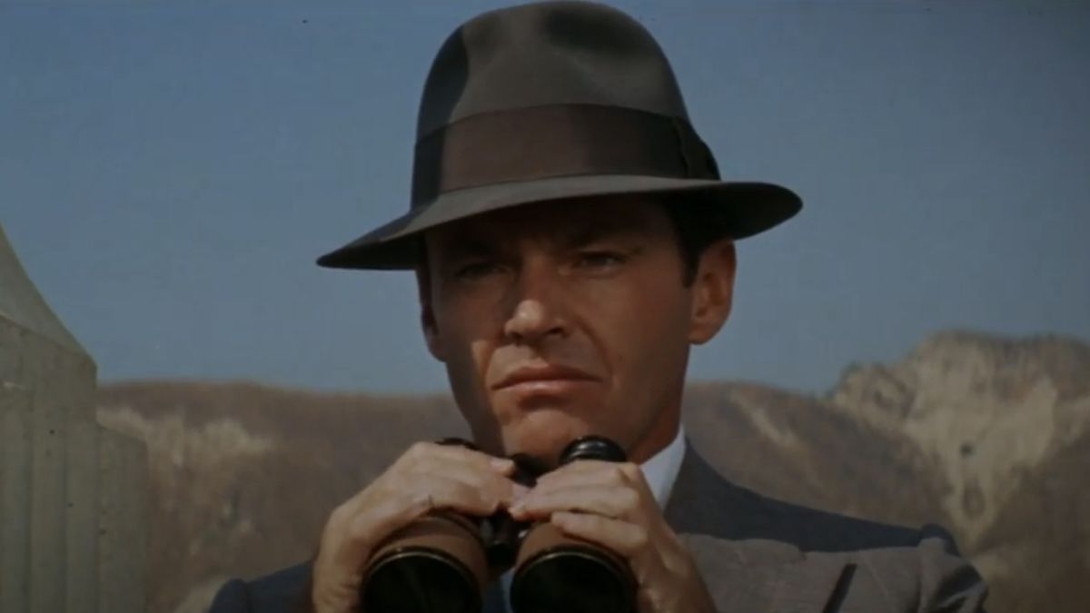 Jack Nicholson as Jake spying with binoculars in Chinatown