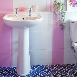bathroom with white washbasin
