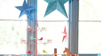 paper star with decoration with christmas parties and windows