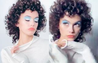 Model Kaia Gerber in a short brown curly wig