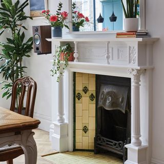 edwardian fireplace with white mantlepiece and tiled cheeks and hearth future