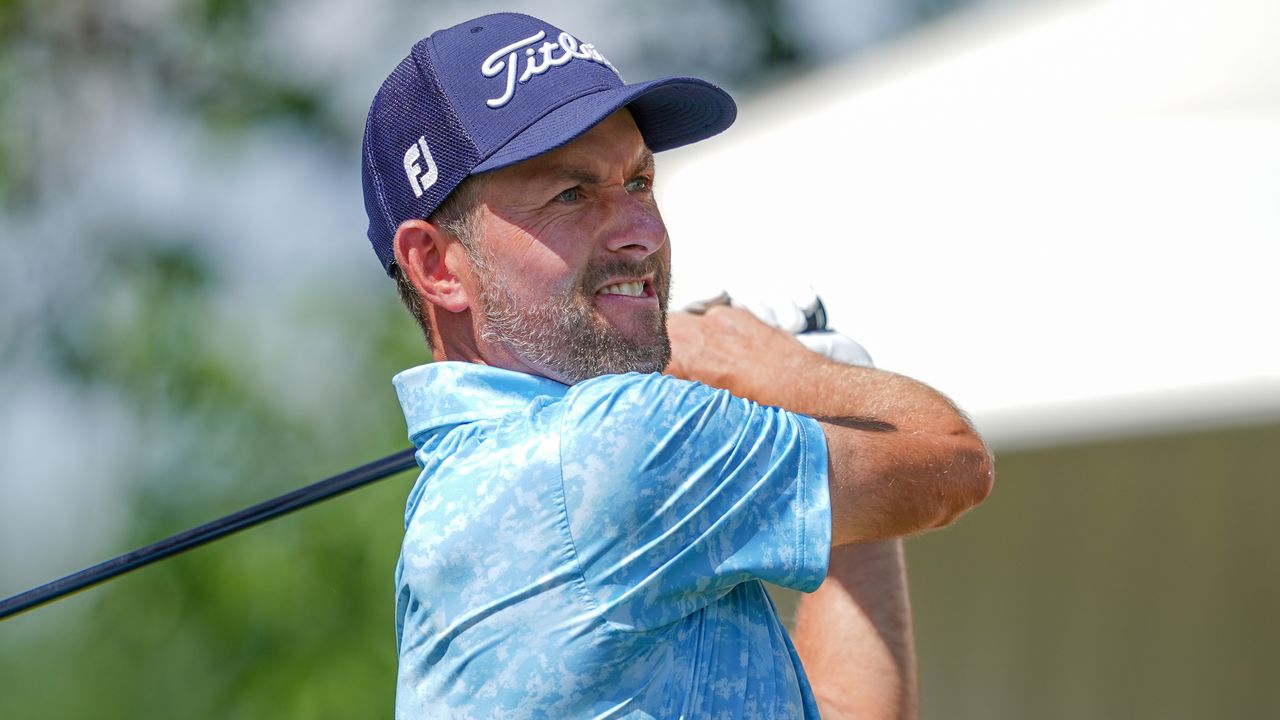 Webb Simpson takes a tee shot at the Wells Fargo Championship