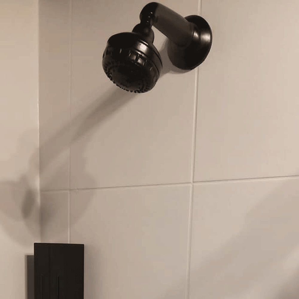 bathroom with black shower