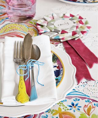 Garden party ideas with painted cutlery on plate