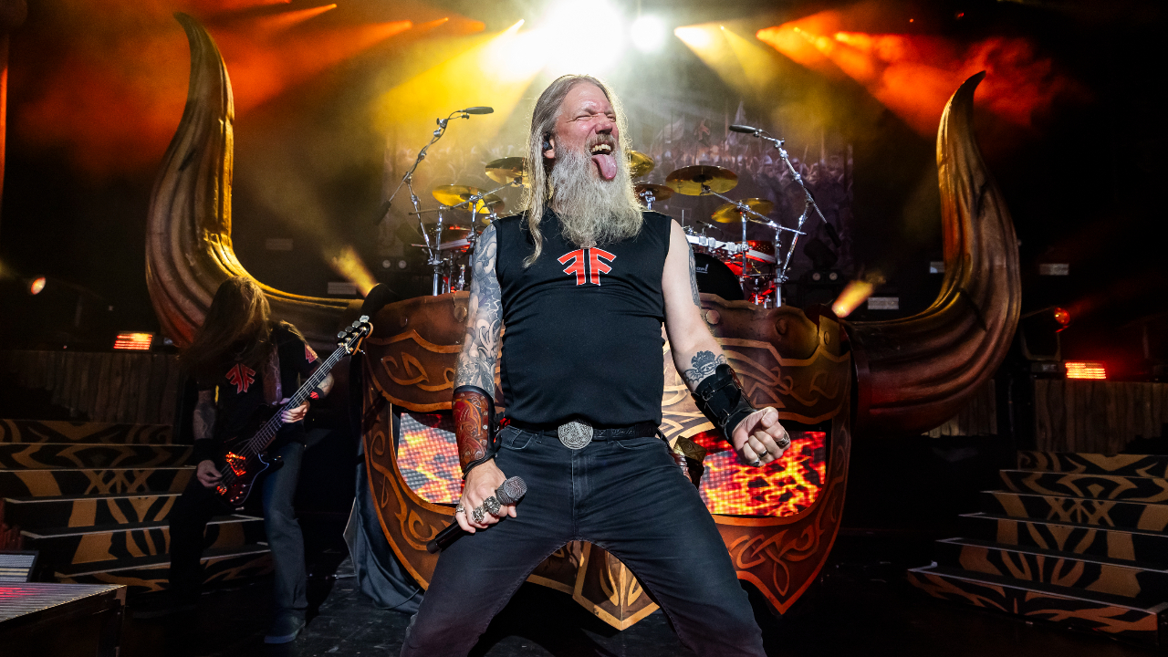 Johan Hegg sticking his tongue out on stage