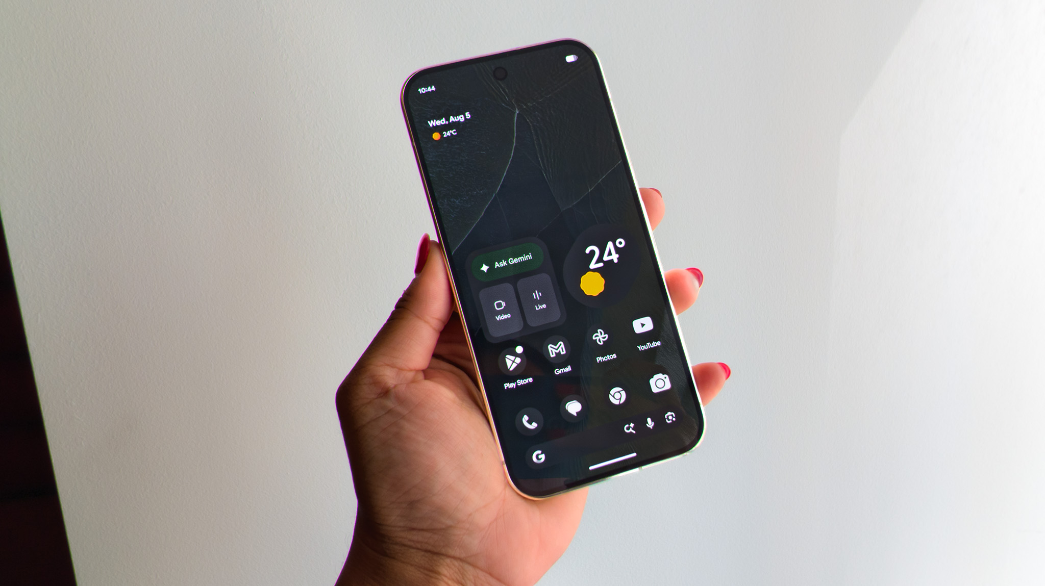 The themed home screen of the Olive Google Pixel 11 Pro