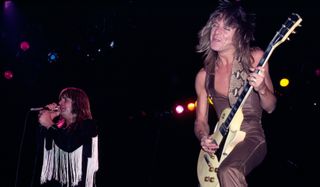 Ozzy Osbourne (left) and Randy Rhoads perform at the Nassau Coliseum in Uniondale, New York on August 14, 1981