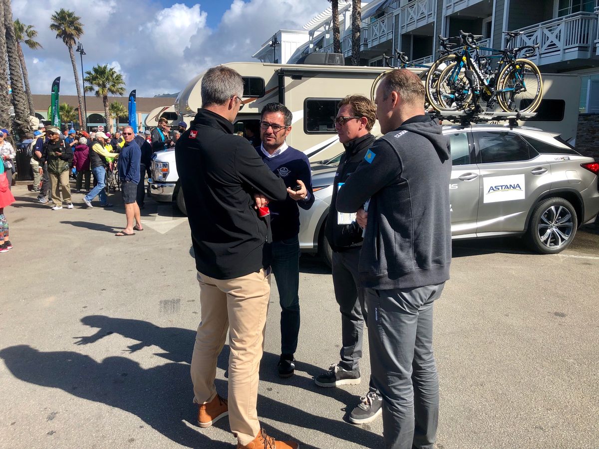 Deceuninck-QuickStep' Ricardo Scheidecker talks with a UCI official at the Tour of California along with Astana's Dmitriy Fofonov and Lars Michaelsen