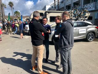 Deceuninck-QuickStep' Ricardo Scheidecker talks with a UCI official at the Tour of California along with Astana's Dmitriy Fofonov and Lars Michaelsen