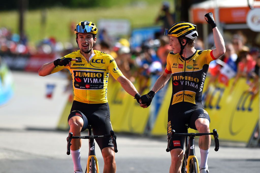 PLATEAU DE SALAISON FRANCE JUNE 12 LR Race winner Primoz Roglic of Slovenia Yellow Leader Jersey and stage winner Jonas Vingegaard Rasmussen of Denmark and Team Jumbo Visma celebrate at finish line during the 74th Criterium du Dauphine 2022 Stage 8 a 1388km stage from SaintAlbanLeysse to Plateau de Salaison 1495m WorldTour Dauphin on June 12 2022 in Plateau de Salaison France Photo by Dario BelingheriGetty Images