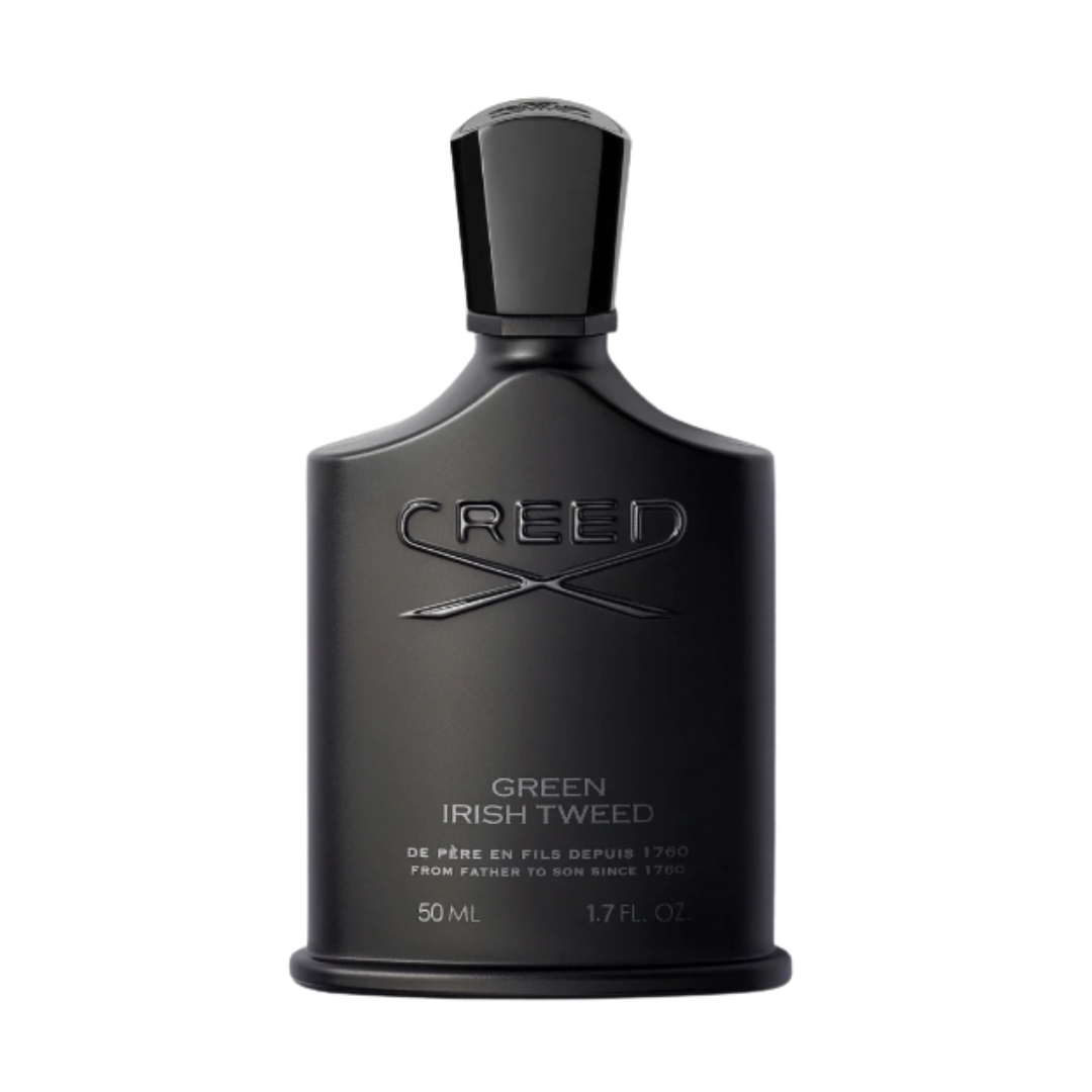 A product shot of the Creed Green Irish Tweed perfume, which has a black bottle and lid, on a white background
