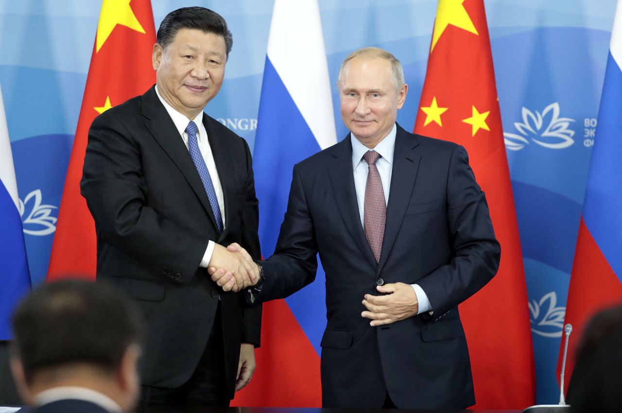 Xi Jinping and Vladimir Putin.