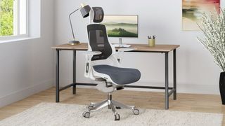 The Uplift Pursuit office chair in front of a desk