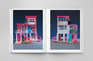 Open pages of Barbie Dreamhouse book showing pink and white house