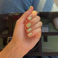 A picture of a milky matcha manicure