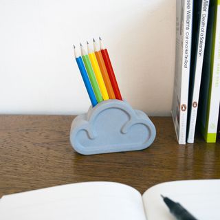 pencil holder with colorful pencils on study table