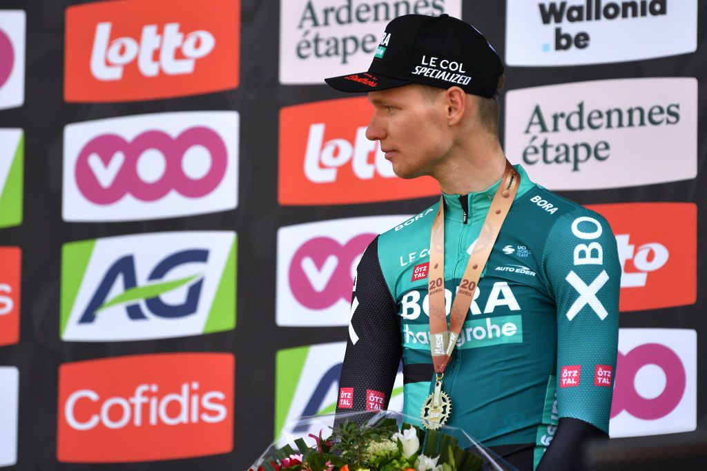 HUY BELGIUM APRIL 20 Vlasov of Russia and Team Bora Hansgrohe on third place poses on the podium ceremony after the 86th La Flche Wallonne 2022 Mens Elite a 2011km one day race from Blegny to Mur de Huy 204m WorldTour FlecheWallonne on April 20 2022 in Huy Belgium Photo by Luc ClaessenGetty Images