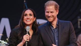 Prince Harry, Duke of Sussex and Meghan, Duchess of Sussex speak on stage at the "Friends @ Home Event"