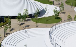 White layered circular roof and circular steps