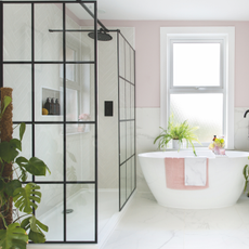 Modern white bathroom with matte black finishes.